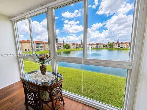 Photo of 2801 N Pine Island Rd #208, Sunrise, FL 33322 (MLS # A12073644)