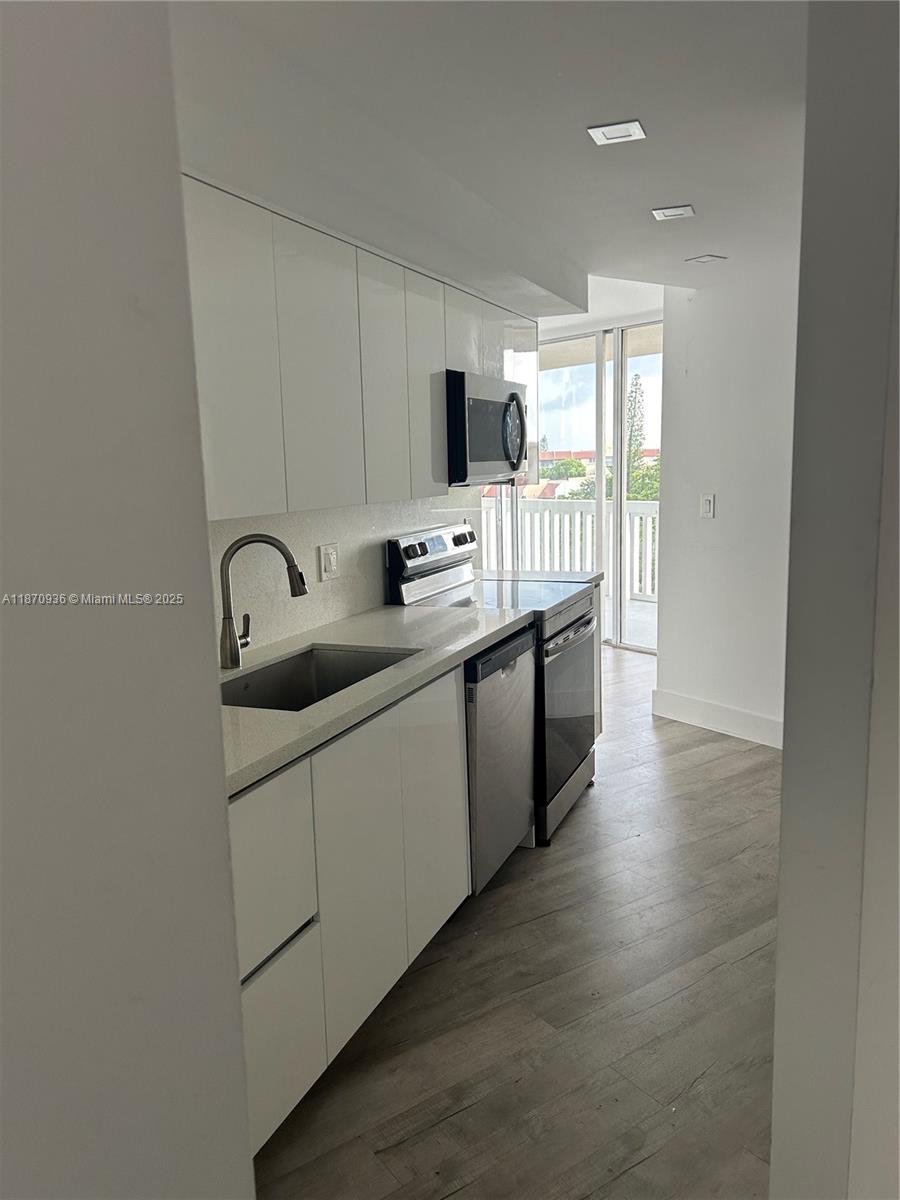 Beautiful private unit on the 7th floor with lovely views of the surrounding area, corner unit, neighbors are at a distance. Large patio with amazing views of the area, laminated floors with upgraded kitchen and bathrooms. Large Master bedroom and bath with separate entrance. Gated entry with community center and lots of amenities such as a gym, basketball court, tennis court, pickle ball court, pool, pool tables, bowling and more. All this is included in your monthly dues. Cable, water, internet is included in your monthly maintenance.