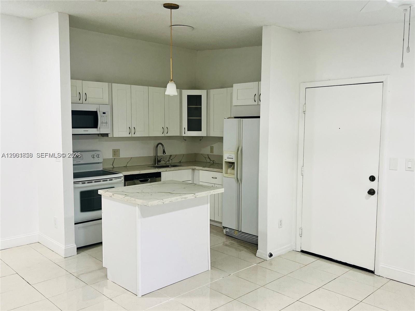 TAMARAC GARDENS CONDOMINI - Residential