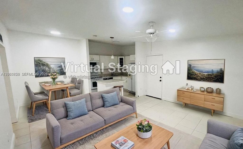 Photo of 9743 W Mcnab Rd #209, Tamarac, FL 33321 (MLS # A12001858)