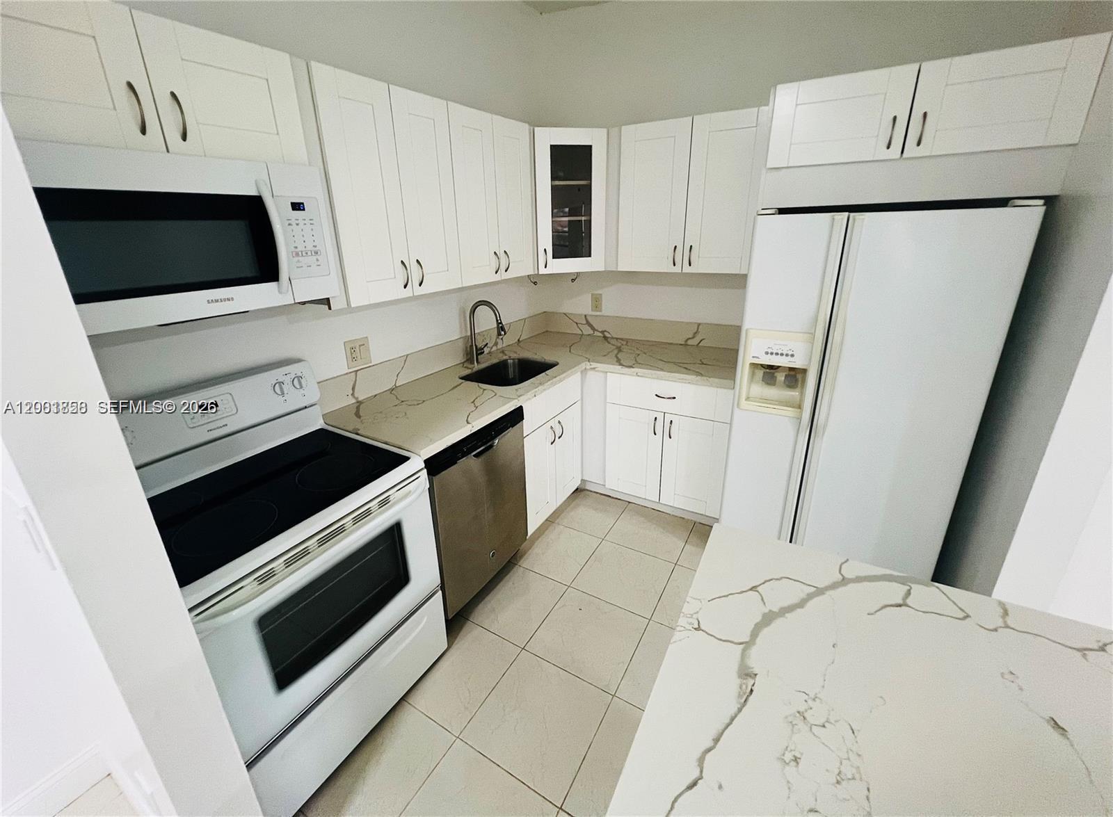 TAMARAC GARDENS CONDOMINI - Residential