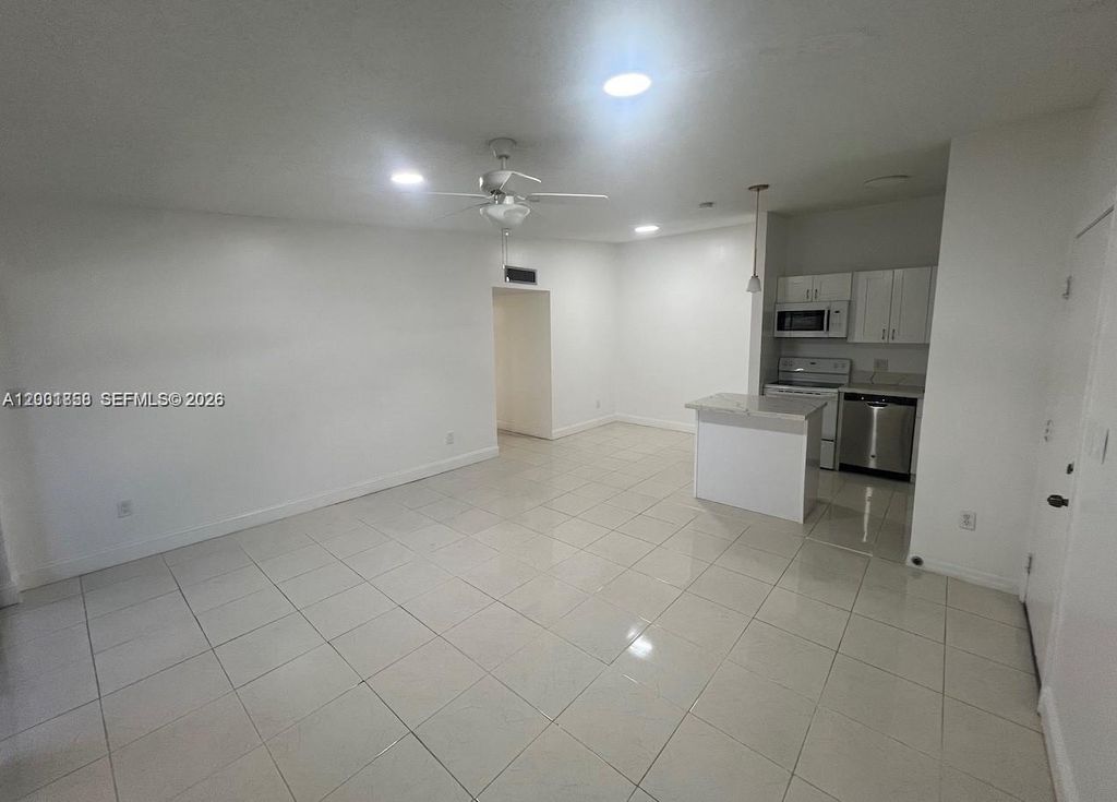 Photo of 9743 W Mcnab Rd #209, Tamarac, FL 33321 (MLS # A12001858)