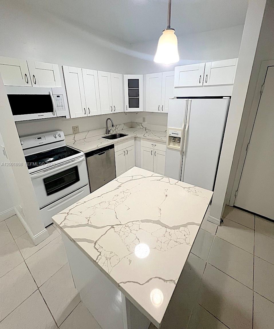 TAMARAC GARDENS CONDOMINI - Residential