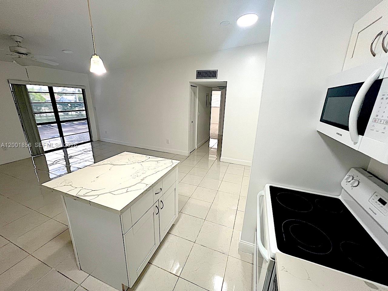 TAMARAC GARDENS CONDOMINI - Residential