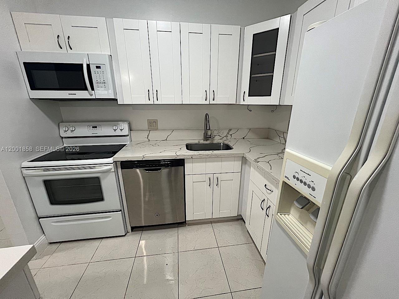 TAMARAC GARDENS CONDOMINI - Residential