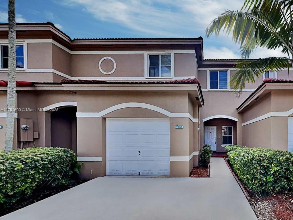 Photo of 7950 S Southwood Cir, Davie, FL 33328 (MLS # A11751600)