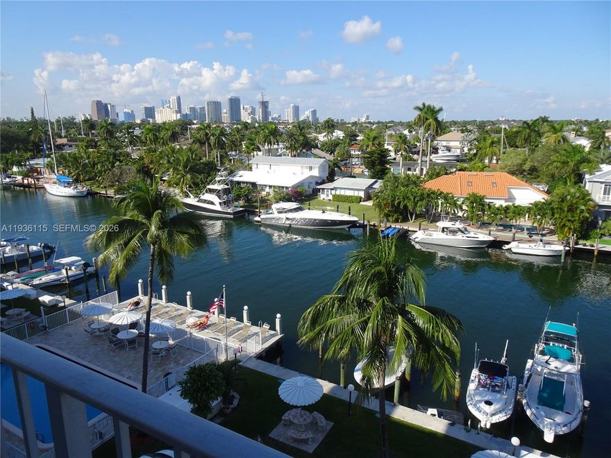 Wake up to panoramic views from this 1/1 on a coveted higher floor with stunning canal & downtown s skyline views. ALL hurricane impact glass. Newer AC (2023), water heater (2025) and electrical panel (2023). Fully remodeled & furnished with a Caribbean beach vibe. Brand new open kitchen features new appliances & marble counter tops. Master bedroom with walk-in closet & new designer bathroom with glass shower enclosure.  Assigned covered spot with ample guest spaces. Amenities included heated & cooled pool & outdoor BBQ area. Dock slips (8' x 30') available for lease & no fixed bridges. Easy access to the airport, beach, shopping & downtown Ft. Lauderdale. No pets permitted.