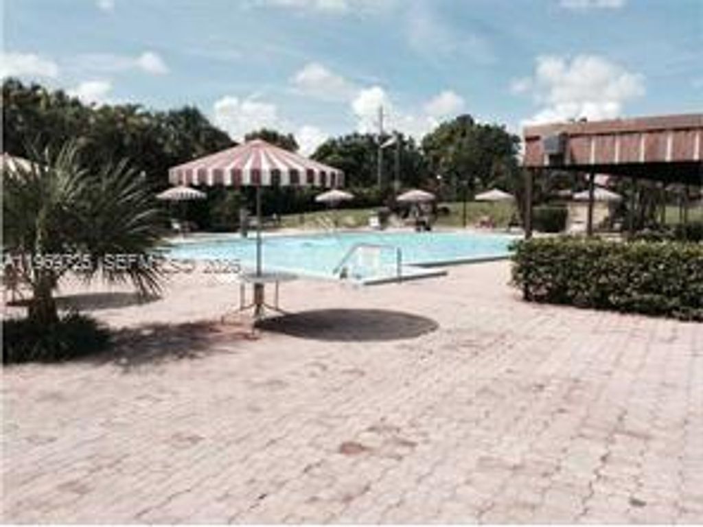 Photo of 7300 NW 17th St #411, Plantation, FL 33313 (MLS # A11969725)