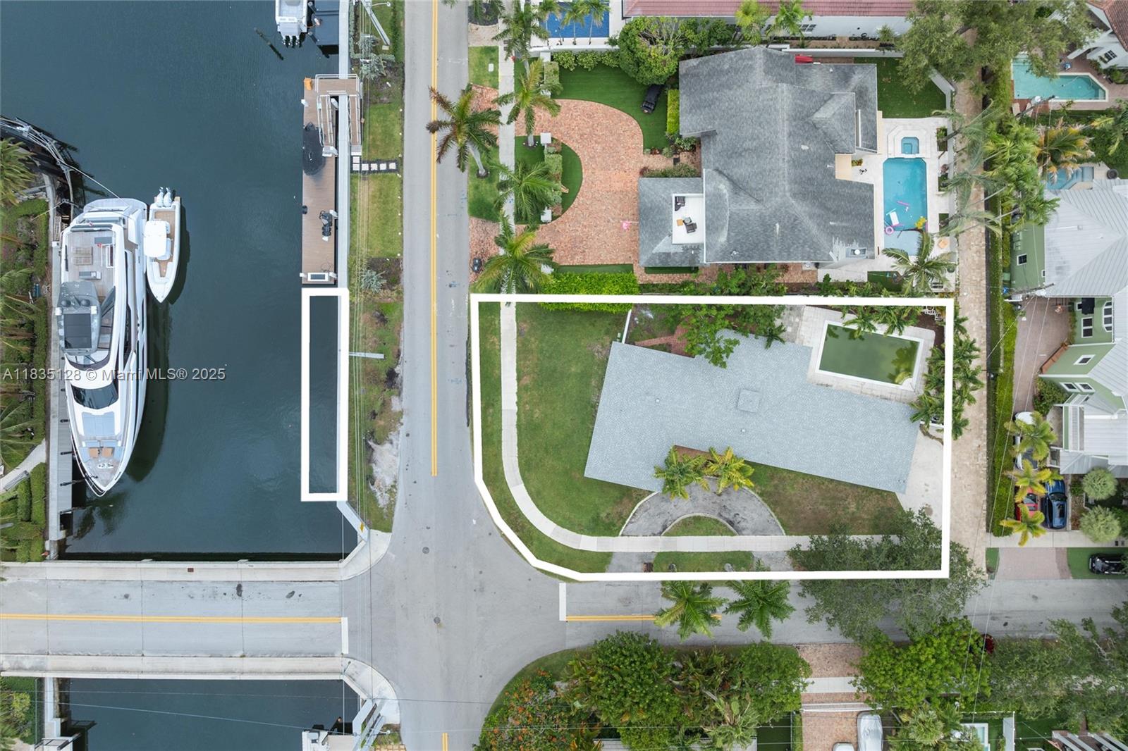 Rio Vista waterfront development opportunity & motivated seller! 9,991 square foot oversized corner lot with approximately 50' of waterfront across the street and a new seawall. Bring your architect and contractor to create a new residence or modernize the existing structure, which has a new roof but is ready for renovation and sold as is. Close proximity to Lauderdale Yacht Club, beach, shopping, dining, nightlife Las Olas/downtown, airport, cruise port, Brightline and all major roads. Rio Vista is one of Fort Lauderdale's premier neighborhoods with top rated public elementary school.