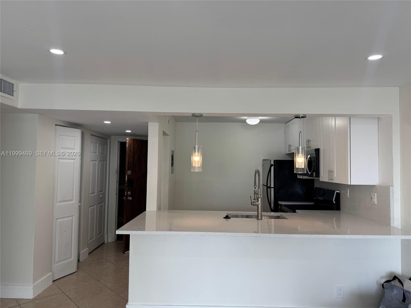 492 NW 165th St Rd C-309