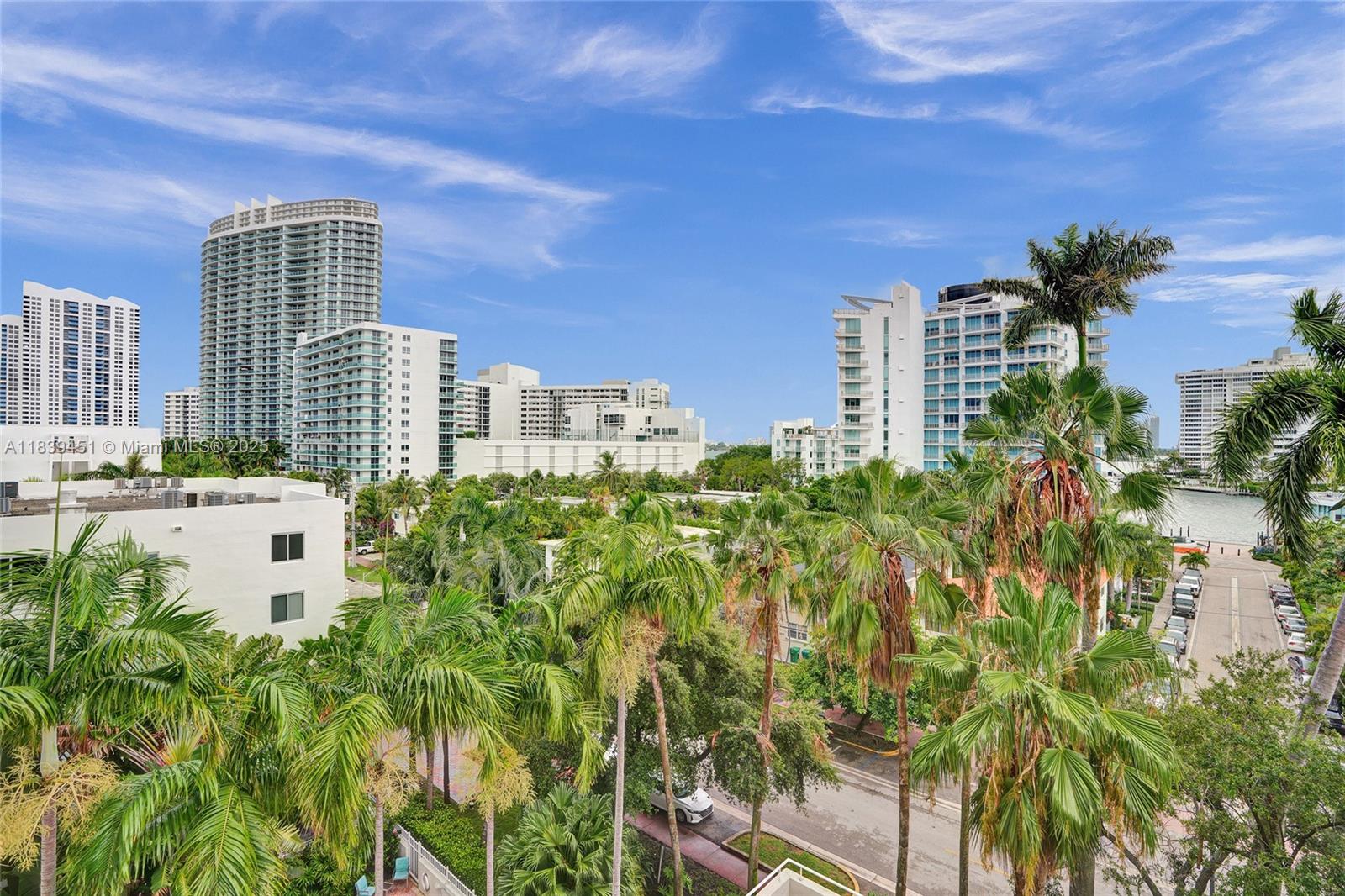 Miami skyline and sunset views welcome you home each evening in this bright and stylish 2BD/2BA South Beach residence. The split floor plan features elegant arched ceilings and a spacious balcony connecting the primary bedroom and living room—perfect for golden hour. Enjoy in-unit washer/dryer, covered parking, and resort-style amenities: heated pool, jacuzzi, gym, sauna, billiards, and lounge. Just moments from Lincoln Road, Sunset Harbour, the beach, and Venetian Islands. Priced to sell—owners are relocating. A rare opportunity to own a beautiful and affordable SOBE home. Unbeatable South Beach location near Lincoln Road Mall’s shops & dining, Sunset Harbour’s waterfront cafes, the scenic Venetian Islands, and the sandy shores... Everything you love about Miami Beach within reach.