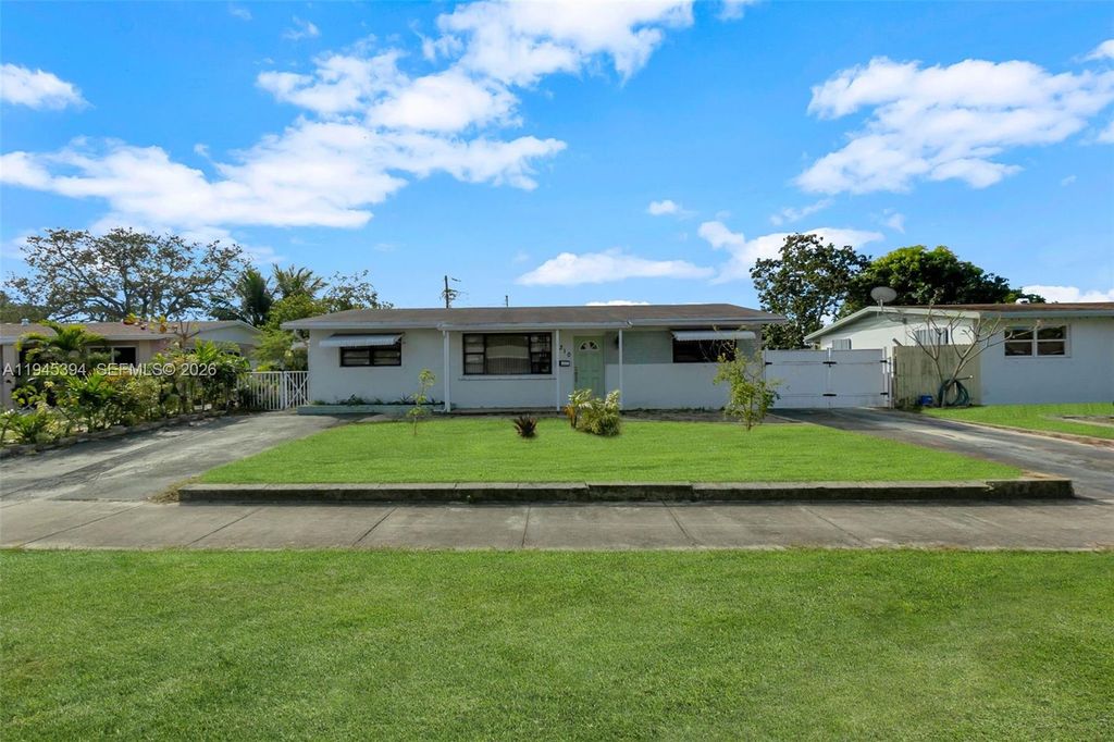 Photo of 1310 NW 42nd St, Oakland Park, FL 33309 (MLS # A11945394)