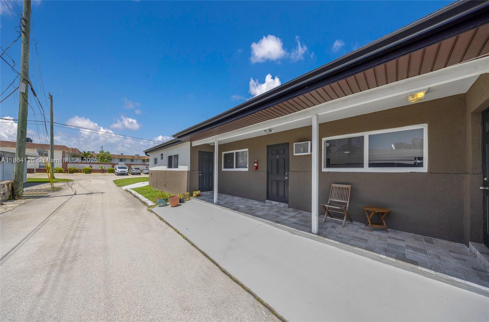 Incredible opportunity to own a well-maintained triplex in a prime location with flexible use options. Property features a 3 bed / 2 bath unit and two 1 bed / 1 bath units, each with tiled flooring, impact windows, updated kitchen cabinets with quartz countertops, and access to private back patios. Unit 1 includes two assigned parking spaces; Units 2 and 3 have one each. All tenants are on month-to-month leases, allowing a buyer the freedom to occupy any unit and generate income from the others. Centrally located near beaches, parks, major highways, shops, and restaurants, ideal for maximizing rental income or long-term growth. Easy to show, please request showing through showing time.
