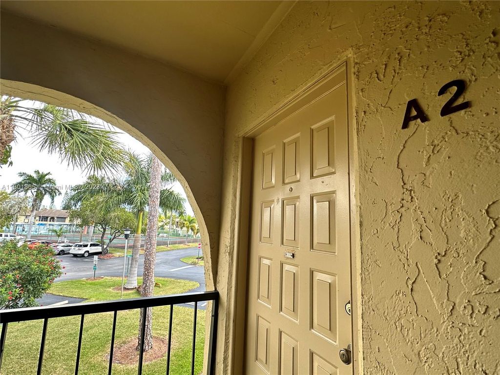 Photo of 303 Pine Ridge Cir #A-2, Green Acres, FL 33463 (MLS # A11301865)