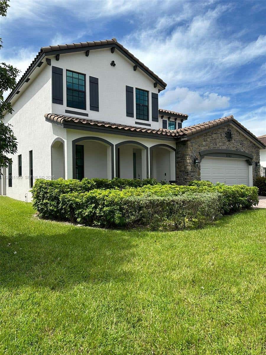 Photo of 3265 Dunning Dr, Royal Palm Beach, FL 33411 (MLS # A12031169)