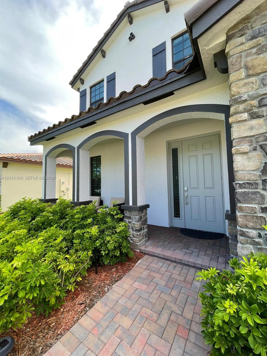 Photo of 3265 Dunning Dr, Royal Palm Beach, FL 33411 (MLS # A12031169)