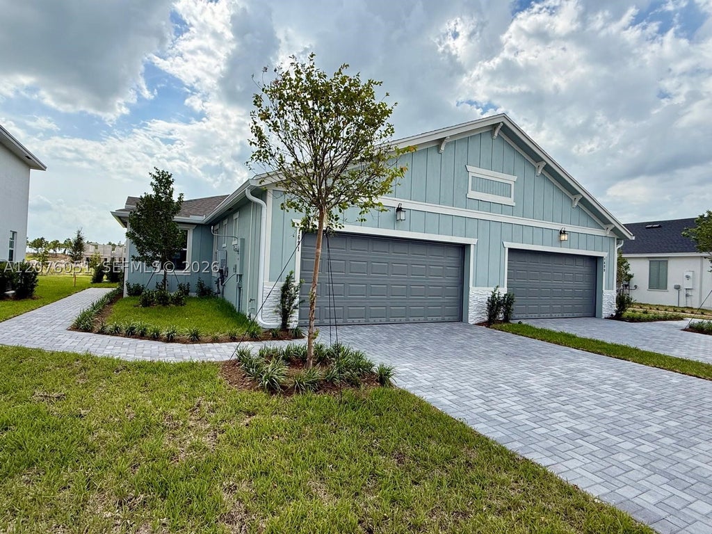 Photo of 1691 Pelican Post Pl #1691, Loxahatchee, FL 33470 (MLS # A12076051)