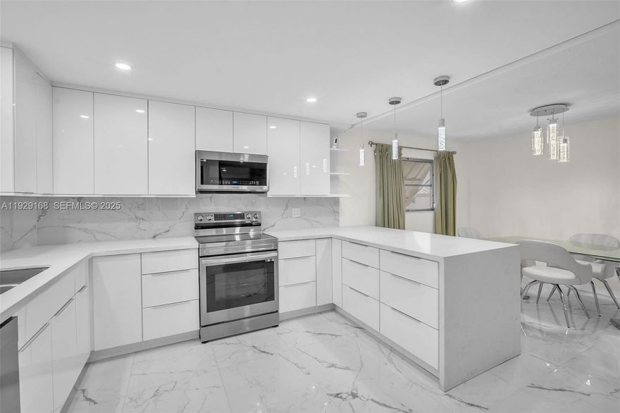 Step into this beautifully updated, move-in-ready unit offering an impressive amount of space and comfort. Enjoy oversized bedrooms and a large walk-in closet. The unit has been tastefully renovated with new tile flooring, fresh finishes, and a bright, inviting layout. Relax on your private screened patio, perfect for morning coffee or evening breezes. The building is well-managed, quiet, and designed for easy living. Elevator and stairs for easy access.  55+ condo. New roof.