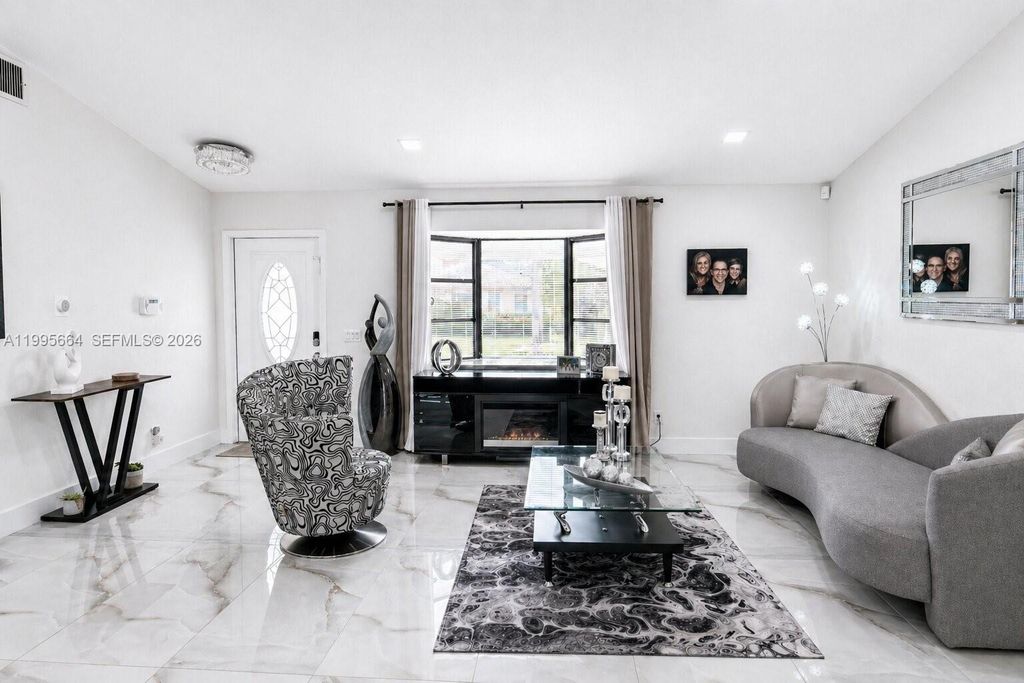 Photo of 8253 NW 2nd Ct, Coral Springs, FL 33071 (MLS # A11995664)