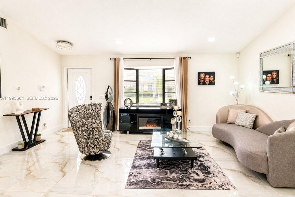 Photo of 8253 NW 2nd Ct, Coral Springs, FL 33071 (MLS # A11995664)
