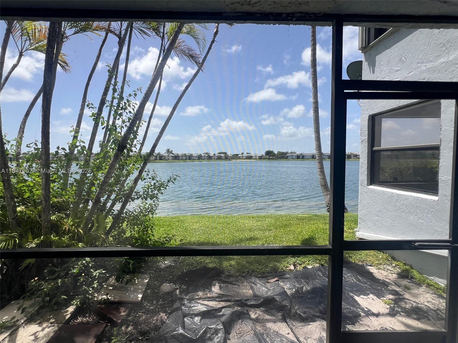 Welcome to this cozy 2-bedroom, 2-bathroom condo located on the 1st floor with gorgeous lake views and a private patio perfect for relaxing. This spacious unit features large rooms, walk-in closets, and an in-unit washer and dryer for your convenience. Enjoy living in a well-maintained, gated community offering a host of lifestyle amenities including community pools, basketball court, clubhouse, children’s play area, and onsite management. With low monthly maintenance and a prime location near major highways, the Turnpike, schools, supermarkets, shopping, and restaurants, this is a perfect place to call home or a smart investment opportunity. Don’t miss out, schedule your showing today! The seller does not accept blind offers or escalation clauses.