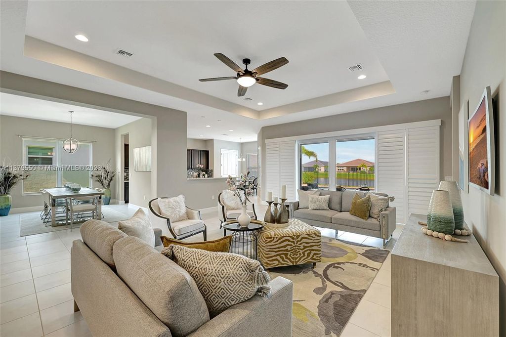 Photo of 11974 SW Laguna Bay Pkwy, Port Saint Lucie, FL 34987 (MLS # A11379550)