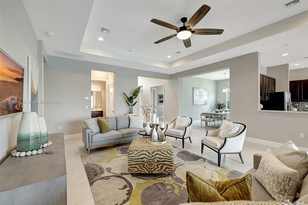 Photo of 11974 SW Laguna Bay Pkwy, Port Saint Lucie, FL 34987 (MLS # A11379550)