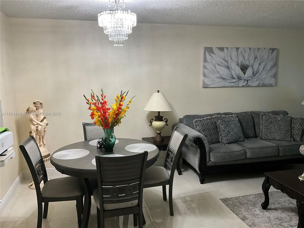 Photo of 300 Berkley Rd #108, Hollywood, FL 33024 (MLS # A11834888)