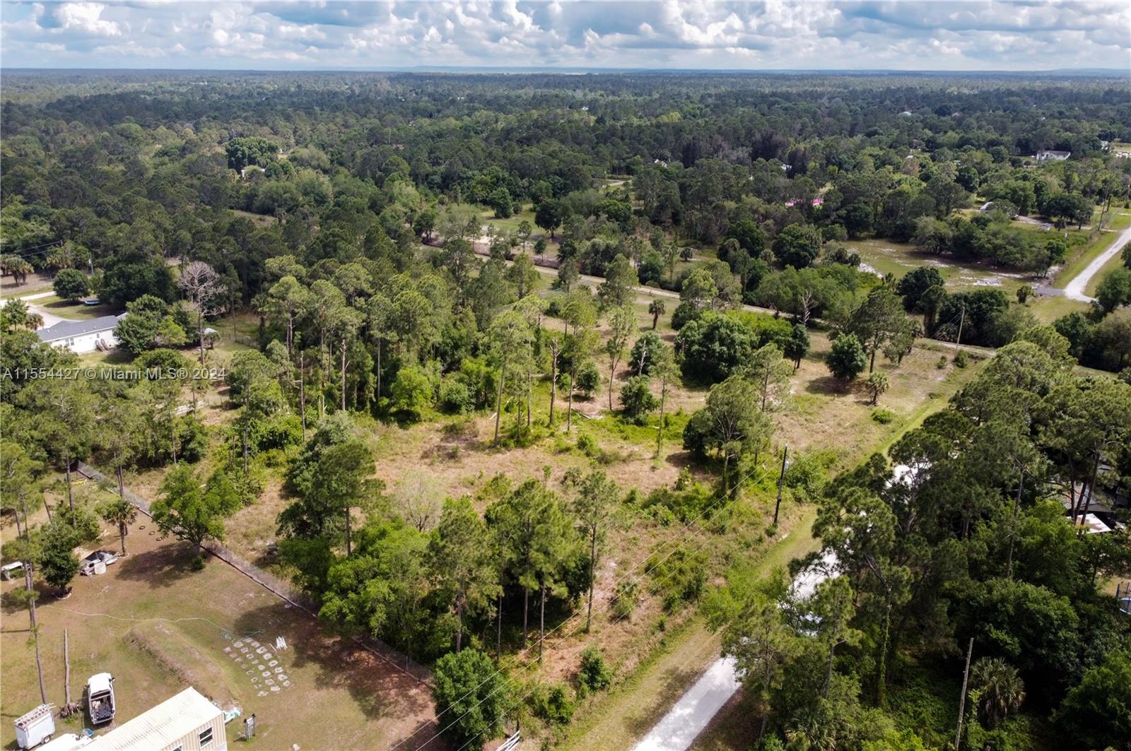 Located in a thriving development area, this lot provides an ideal setting for building a farm, placing a mobile home, or raising animals. Additionally, it benefits from high-speed internet access, fiber optics, and all necessary public utilities ready for connection. Adding to this, the owner also has Lot 165 on S Olivo St., offering the opportunity to acquire both properties in a unique and exclusive offer.