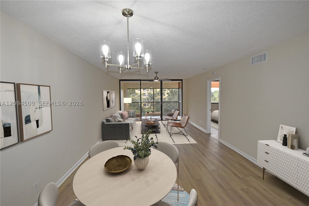 Photo of 8592 W Sunrise Blvd #303, Plantation, FL 33322 (MLS # A12094509)