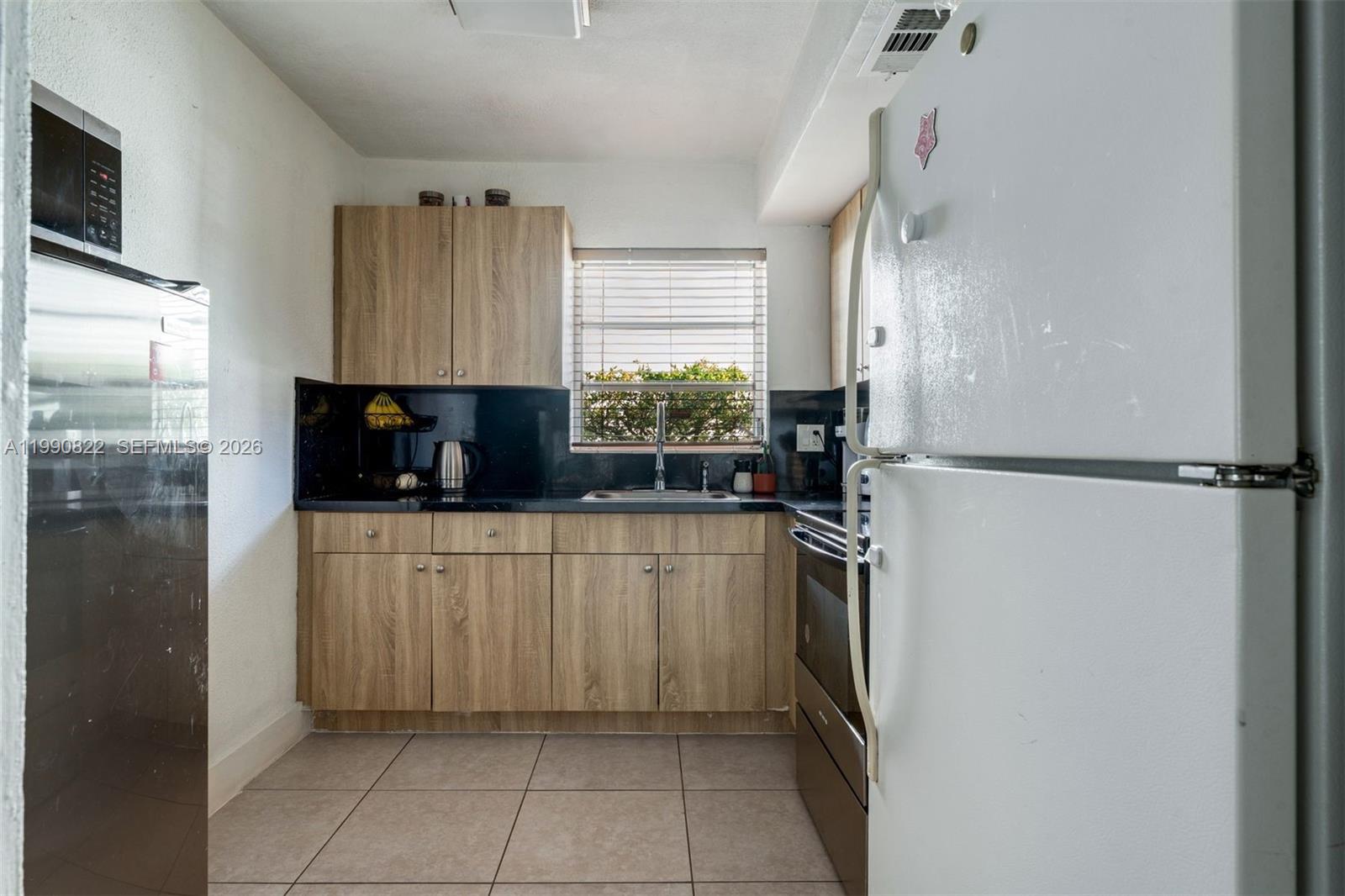 VILLAGE AT DADELAND CONDO - Residential