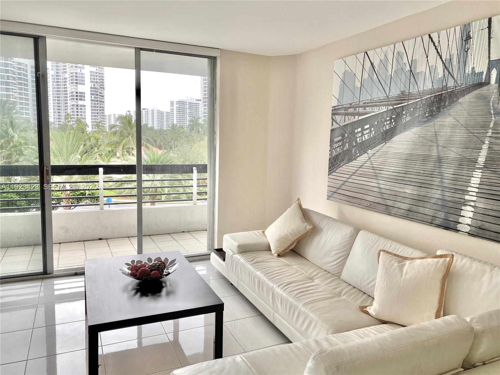 Properties 2 19195 NE 36th Ct 402