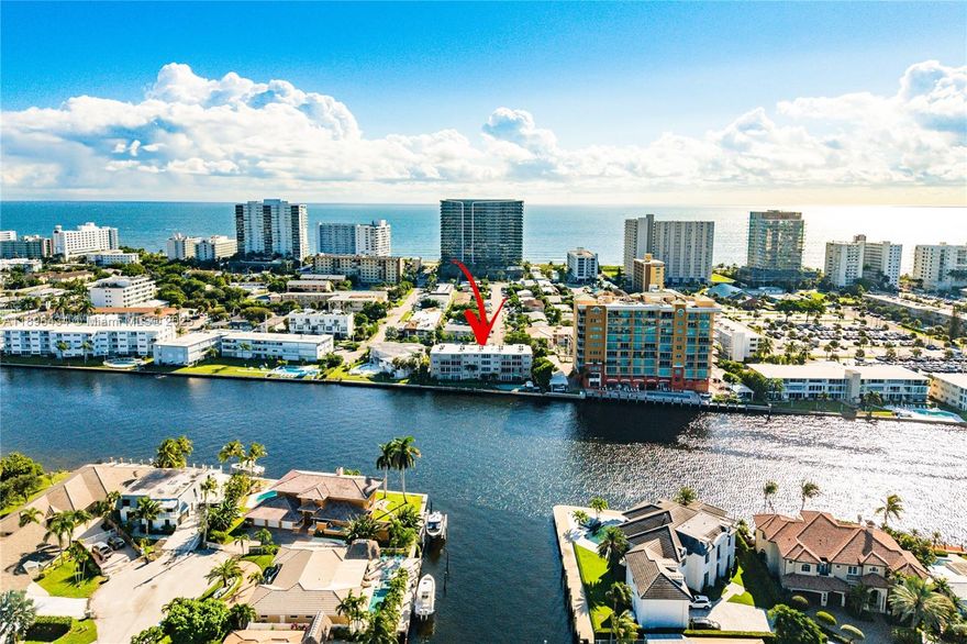 Experience true coastal living with this beautifully updated 2-bedroom, 2-bath unit offering breathtaking direct Intracoastal and sunset views! This bright, spacious unit features an open-concept layout with a modern kitchen complete with granite countertops, stainless steel appliances, and a convenient breakfast bar. Enjoy peace of mind with impact windows and doors (2020), a new roof (2025), a newer AC and water heater. The enclosed Florida room offers the perfect spot to relax and take in views of the water and pool. Washer and dryer in-unit. The community offers a heated pool, BBQ area, and shuffleboard. One assigned parking spot with guest spots available. Ideally located just blocks from the newly revitalized Pompano Beach Pier, restaurants, shopping and golf.