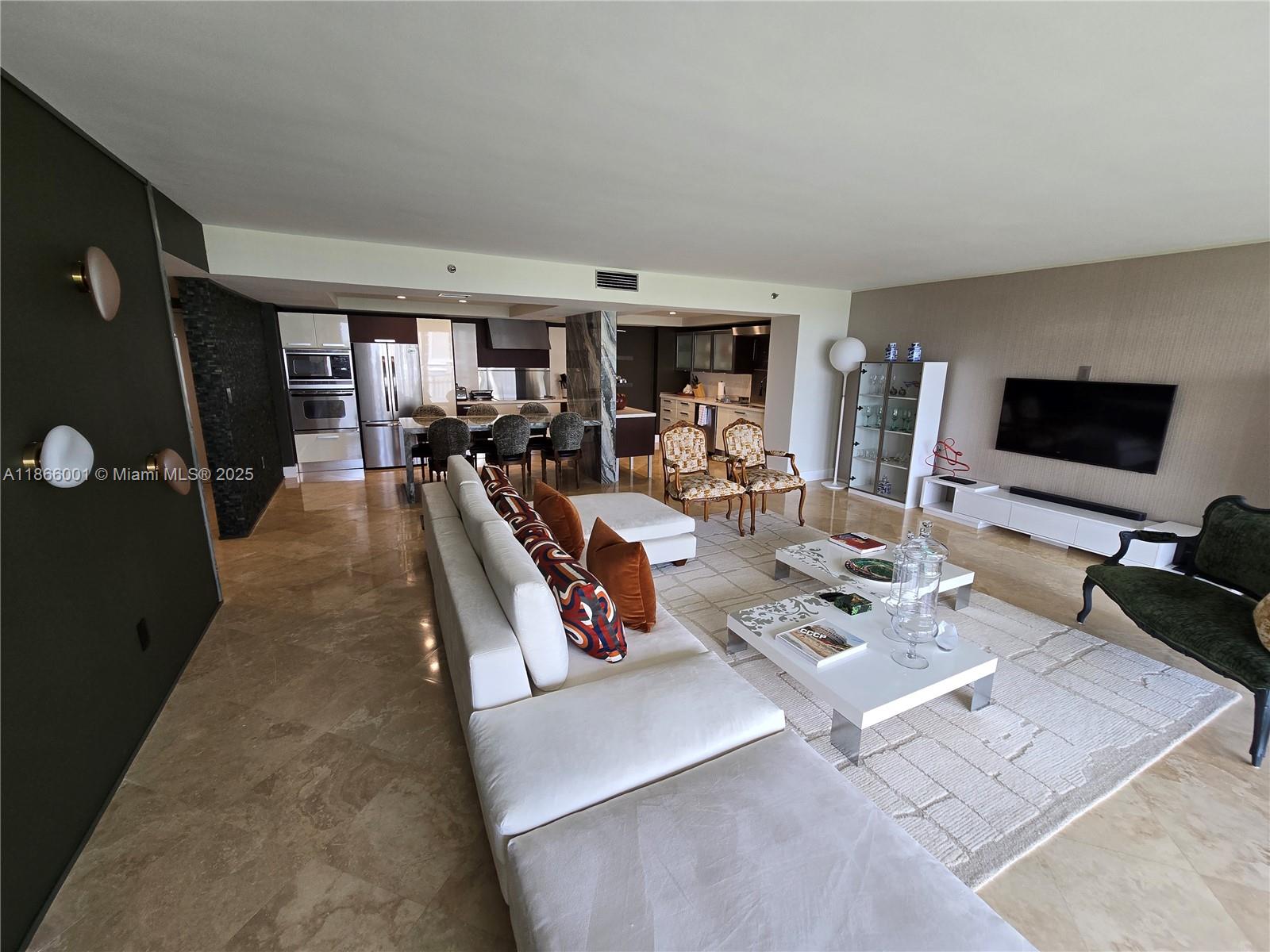 Welcome to your dream condo in the prestigious Jockey Club III community! This stunning FULLY FURNISHED unit features 2 bedrooms, 2 bathrooms, and a spacious 1 car garage. The open floor plan is perfect for entertaining, with tile flooring throughout and a breathtaking bay view. Step outside onto your balcony and enjoy the cool ocean breeze.The Jockey Club III community offers an array of amenities for residents to enjoy, including a sparkling community pool, sauna, spa, tennis court, and a child play area. Whether you're looking to relax and unwind or stay active and fit, this community has something for everyone. Don't miss out on this incredible opportunity to live in luxury and style at Jockey Club III. Schedule a showing today and make this condo your new home sweet home!