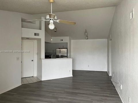 Photo of 12430 Vista Isles Dr #1322, Sunrise, FL 33325 (MLS # A11950165)