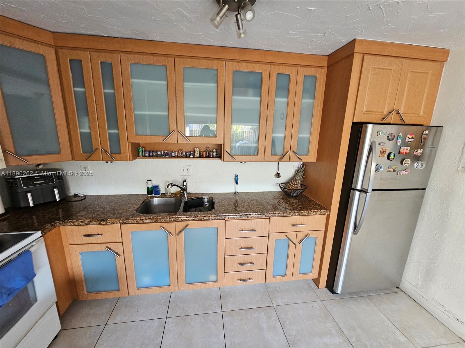 DORAL GARDENS CONDO - Residential Lease