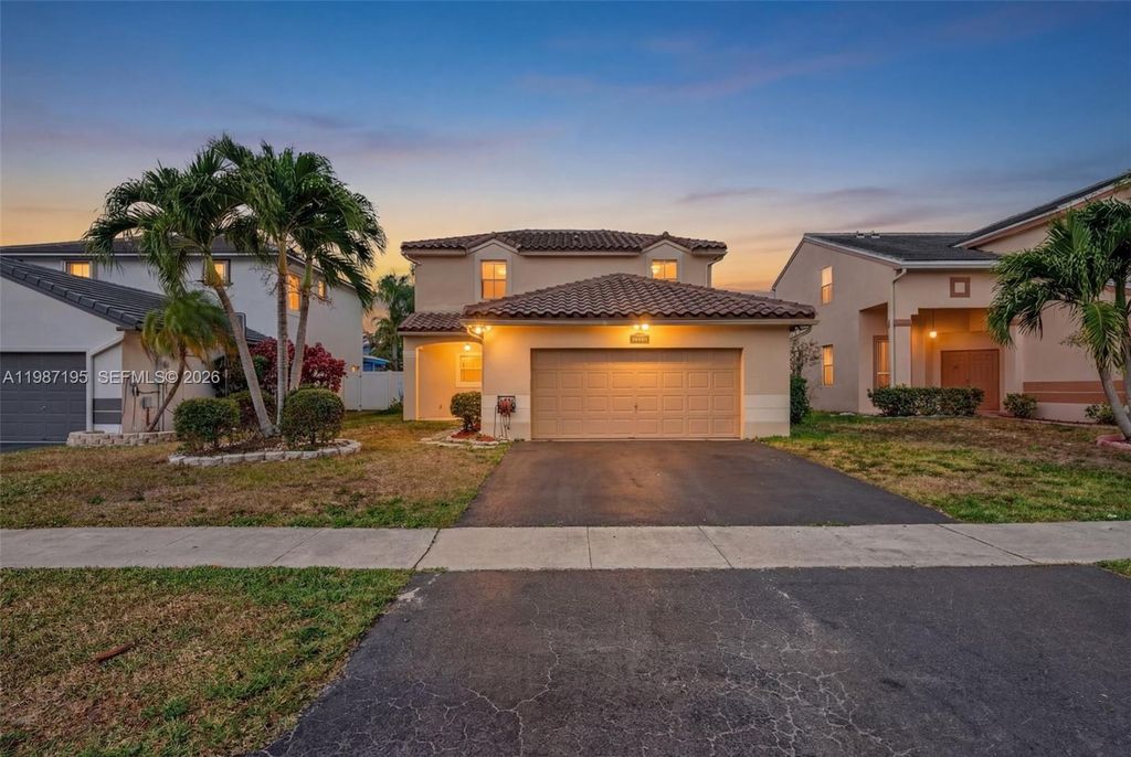 Photo of 2166 NW 191st Ave, Pembroke Pines, FL 33029 (MLS # A11987195)