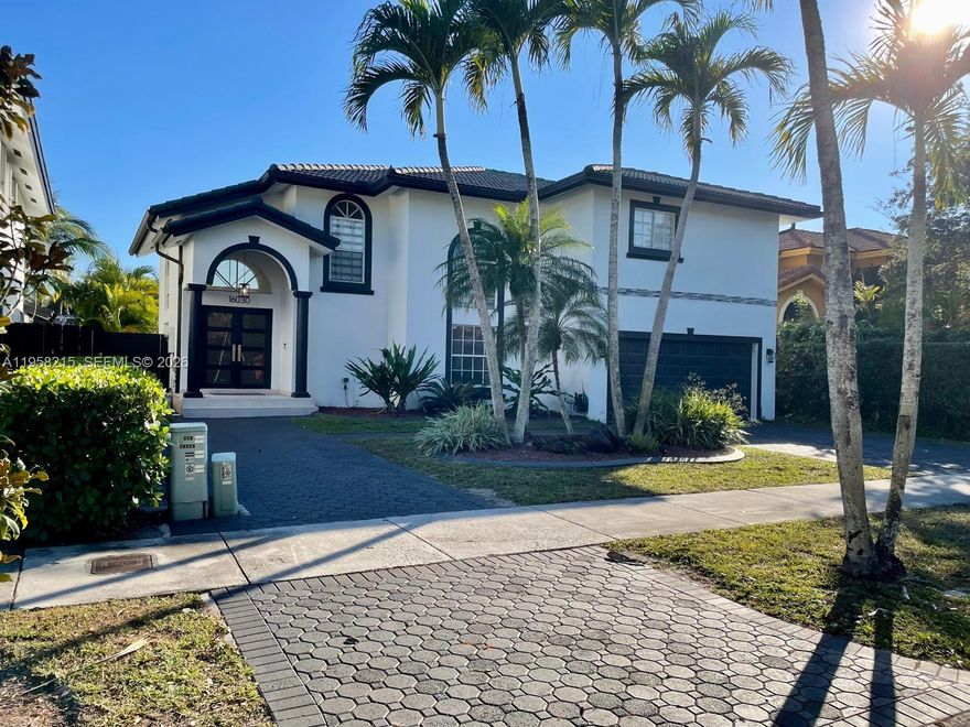 Beautiful two-story home featuring 4 bedrooms and 3 full bathrooms, including a convenient bedroom and bathroom on the first floor. Step outside to a spectacular patio showcasing a brand-new resort-style heated pool with water fountain, saltwater system, and tanning ledge, surrounded by lush palm trees and offering serene lake views. This outdoor space is perfect for relaxing or entertaining family and friends.The home is filled with abundant natural light and features a unique interior garden between the formal living and dining rooms. Additional highlights include cathedral ceilings, a 2-car garage, laundry room, walk-in closets, and a new metal fence in the backyard.Located in a quiet, family-friendly neighborhood with no HOA, this home is conveniently close to major expressways, shopping, hospitals, and A+ schools.Call now for showing instructions.