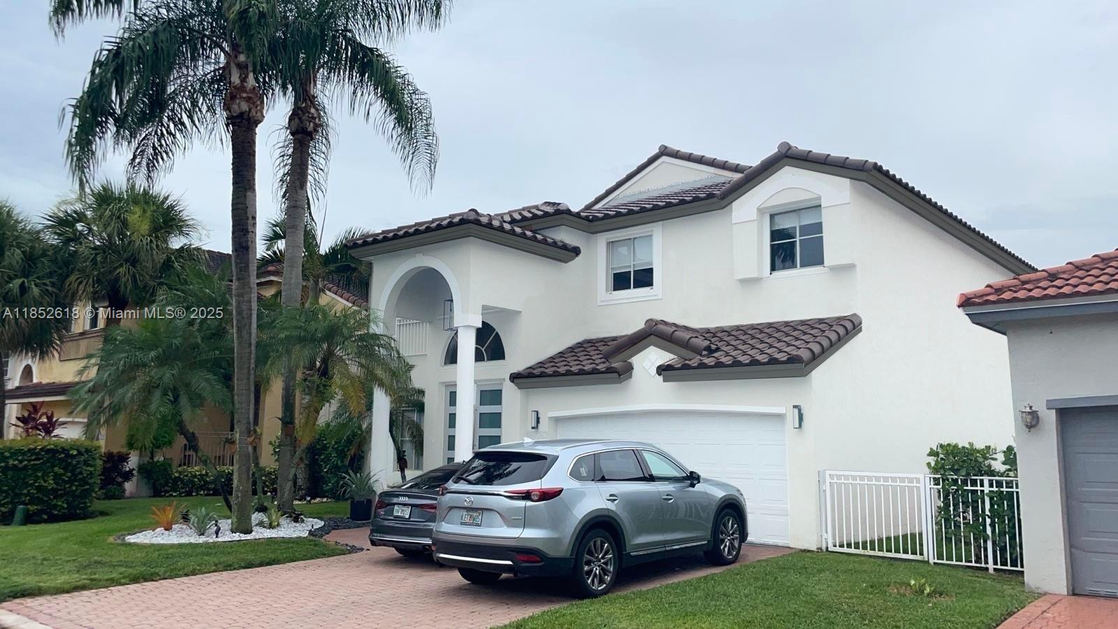 GORGEOUS SINGLE FAMILY IN THE HEART OF PEMBROKE PINES IN THE SOUGHT AFTER GRAND PALMS. CLOSE TO MAIN ROADS, SHOPPING AND HIGHWAYS. QUIET NEIGHBORHOOD IN A RESORT STYLE GATED COMMUNITY. COMPLETELY RENOVATED WITH ENGINEERED WOOD FLOORS, FRESHLY PAINTED, MARBLE IN MASTER BATHROOM WITH FRAMELESS SHOWER GLASS AND DOUBLE VANITIES, CUSTOM MADE CABINETS WITH GRANITE COUNTERTOPS, SOLAR PANELS FOR ADDED BENEFIT OF LOW ELECTRIC BILL, SMART THERMOSTAT, MODERN STYLE POOL WITH MOTORIZED AWNINGS. EV CHARGER READY. GARAGE HAS BEEN UPGRADED AS AN UNDER AIR CONDITIONING SPACE THAT CURRENTLY IS SET AS A GOLF SIMULATOR AND/OR THEATER ROOM IDEAL TO ENTERTAIN YOUR GUESTS AND TO HAVE LOTS OF FUN. BRING YOUR PICKIEST CLIENTS. WON'T LAST.