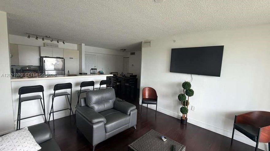 Excellent 2-bedroom, 1-bathroom, well-maintained corner condo located in the desirable Enclave at Doral. This well maintained first-floor unit offers 818sqft. of living space with a functional layout and beautiful water views. Features include 2 assigned parking spaces, a detached garage/storage unit, and in-unit washer and dryer. Tenant occupied until January 2027; tenant requires 30 days' notice to vacate the unit if needed, amenities include poo/spa, clubhouse, gym, tennis courts, billiards room, and kids' park. Conveniently located near mayor highways, shopping, restaurants, hospitals, and top-rated schools.