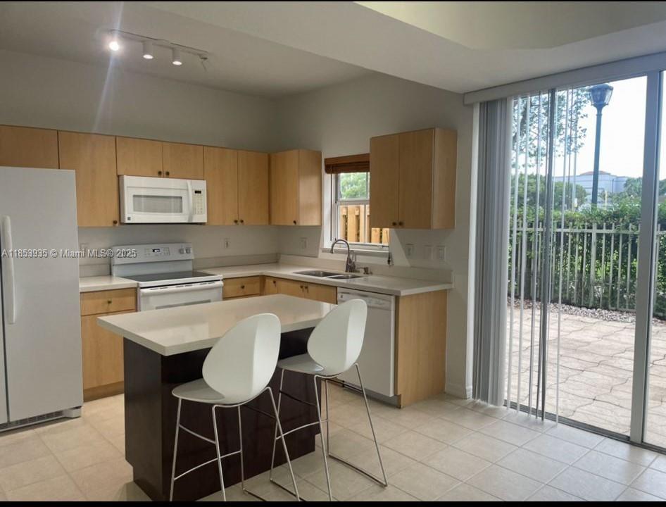 Beautiful 2/2 townhouse in Doral at The Gates. Two master bedrooms upstairs. One half bath on the first floor. Extra-large storage under the stairs. Patio with garden view. Open concept layout. Hard flooring on the second floor and tiles on the first. Gated community. Excellent schools. Walking distance to EBT Elementary School. Close to Turnpike, Palmetto, public transportation, Dolphin Mall, Trolleys, and more! First month’s rent plus ONLY one months’ security deposit required. Call the listing agent for more info. Tenant occupied, appointments only.
This unit is the bigger style of the 2/2.5 TH