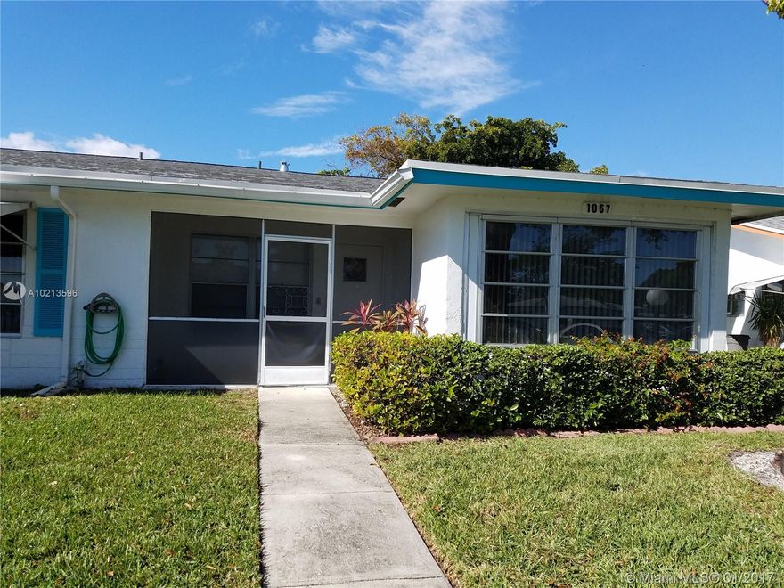 Wow!  Won't last! Rarely available 2 bedroom corner unit on water with tiled, air conditioned front den. Washer/dryer in unit. Large living room, eat-in-kitchen, dining room.  Partly updated master bath. Your personal touches will make this a beauty!  Great value in a fabulous neighborhood with all kinds of amenities, including 2 community pools, tennis, clubhouse, various activities and entertainment for all.  One person must be 0/55.