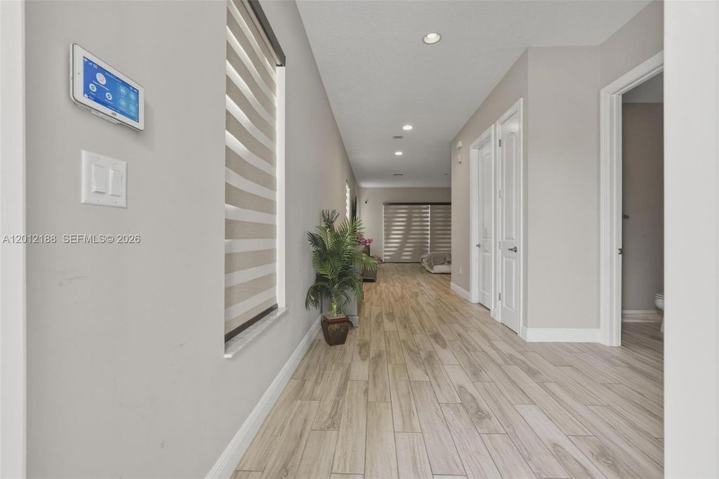 Photo of 8815 NW 37th Dr, Coral Springs, FL 33065 (MLS # A12012188)
