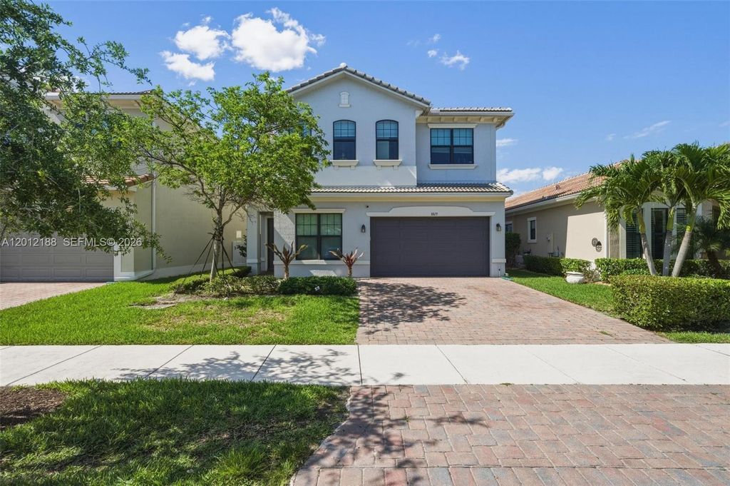 Photo of 8815 NW 37th Dr, Coral Springs, FL 33065 (MLS # A12012188)