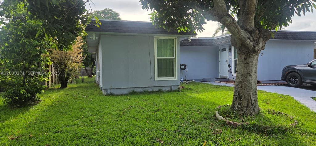 Photo of 7907 NW 73rd Ave, Tamarac, FL 33321 (MLS # A12038271)