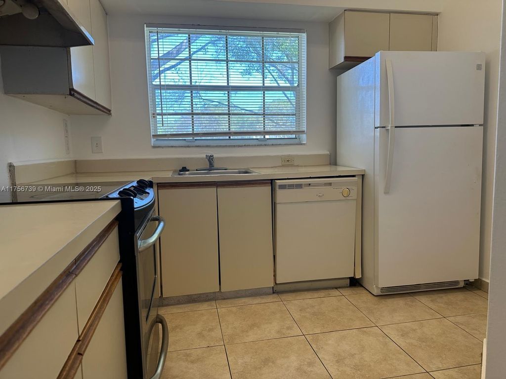 Photo of 651 Cypress Lake Blvd #I19, Deerfield Beach, FL 33064 (MLS # A11756739)