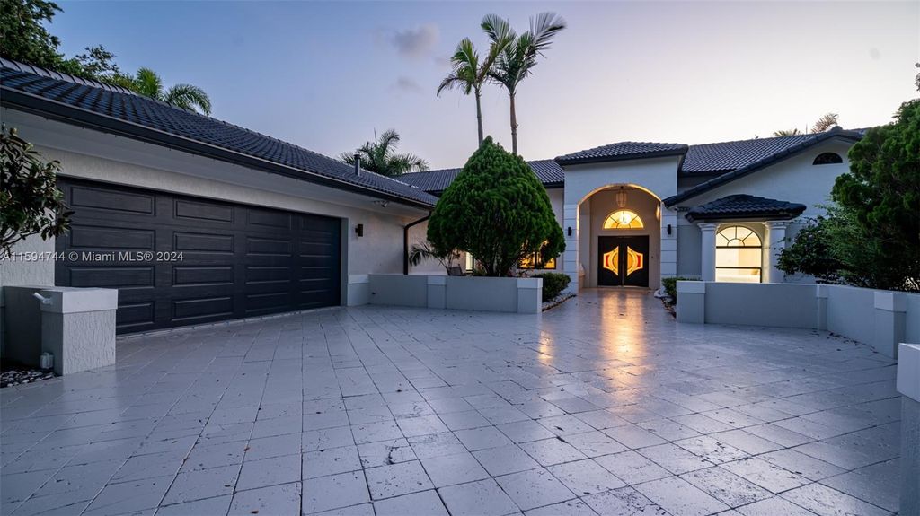 Photo of 1361 NW 116th Ave, Plantation, FL 33323 (MLS # A11594744)