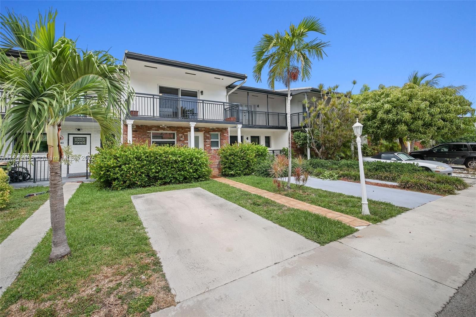Live the San Souci Lifestyle – Step into this fully renovated 2-bed, 2.5-bath townhouse where modern design meets unbeatable location. From the moment you enter, you’re welcomed by an open, sun-drenched layout, sleek white porcelain floors, and a stylish eat-in kitchen with granite countertops—perfect for everyday living or entertaining. Host friends & family on your oversized private patio, or unwind with a morning coffee as the sun rises over the nearby pier. Just one block from the Causeway, this townhome places you minutes from Miami Beach, Whole Foods, restaurants, LA Fitness, and lush parks. Whether you’re searching for your forever home or a chic retreat offering comfort & convenience, this move-in-ready gem delivers. Opportunities like this don’t last—come see it before it’s gone!