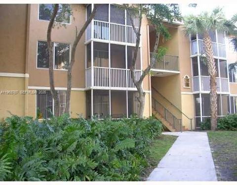 Photo of 4055 W Mcnab Rd #H303, Pompano Beach, FL 33069 (MLS # A11963787)