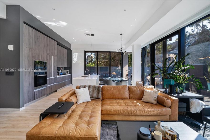 Corner 2-bedroom, 2.5-bath residence now available at Glasshaus, an exclusive 23-unit boutique building located in the center of Coconut Grove. The home features 12-foot ceilings, Miele appliances, motorized window treatments, a Lutron dimmable lighting system, custom-built closets, and contemporary designer lighting throughout.
A standout feature is the expansive 800+ sq ft wraparound terrace with a private jacuzzi. Two covered parking spaces are included. This unit is located just moments from CocoWalk, Kennedy Park, and many of Coconut Grove’s restaurants and shops.